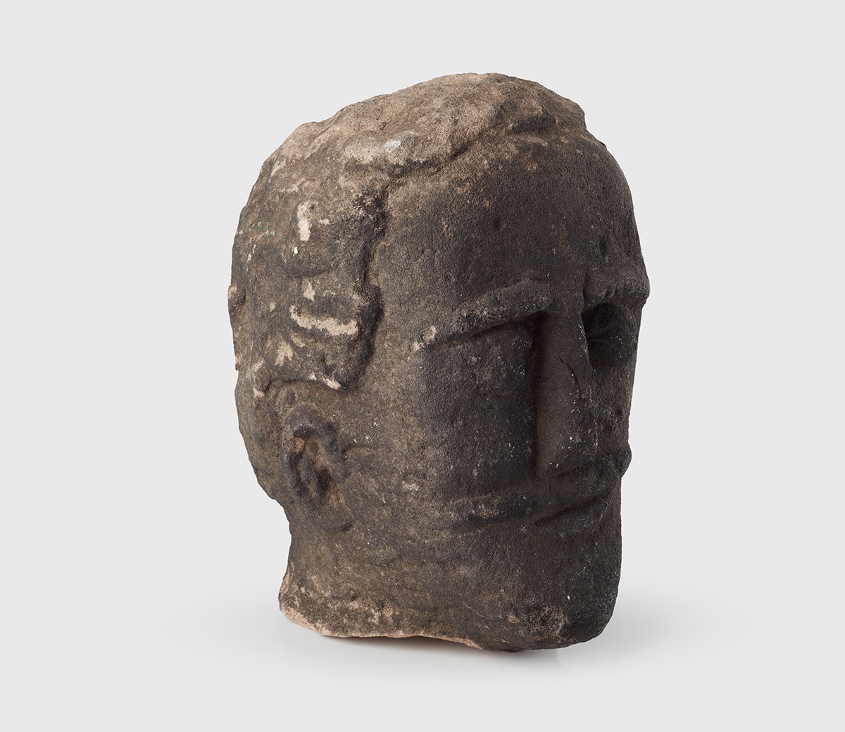 LOT 55 | ANCIENT CELTIC STONE HEAD | UNITED KINGDOM, LIKELY 1ST CENTURY B.C. £10,000 - £15,000 + fees