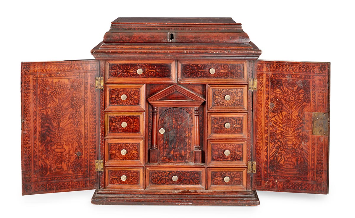 LOT 197 | Y NORTH ITALIAN ALTO ADIGE CYPRESS AND CEDAR WOOD AND POKER-WORK TABLE CABINET EARLY 17TH CENTURY | £1,000 - £1,500 + fees