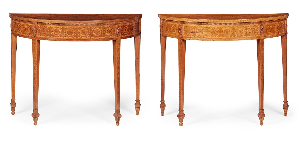 LOT 161 | ◆ PAIR OF GEORGE III SATINWOOD AND MARQUETRY DEMILUNE CONSOLE TABLES, ATTRIBUTED TO THOMAS CHIPPENDALE | CIRCA 1760 | (2) 115cm wide, 91cm high, 48cm high | £70,000 - £90,000 + fees