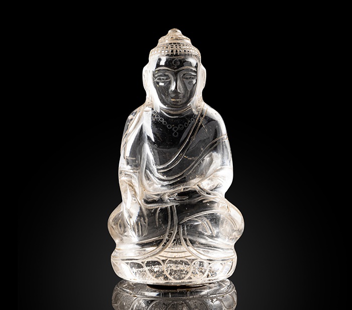 ROCK CRYSTAL CARVING OF A SEATED BUDDHA