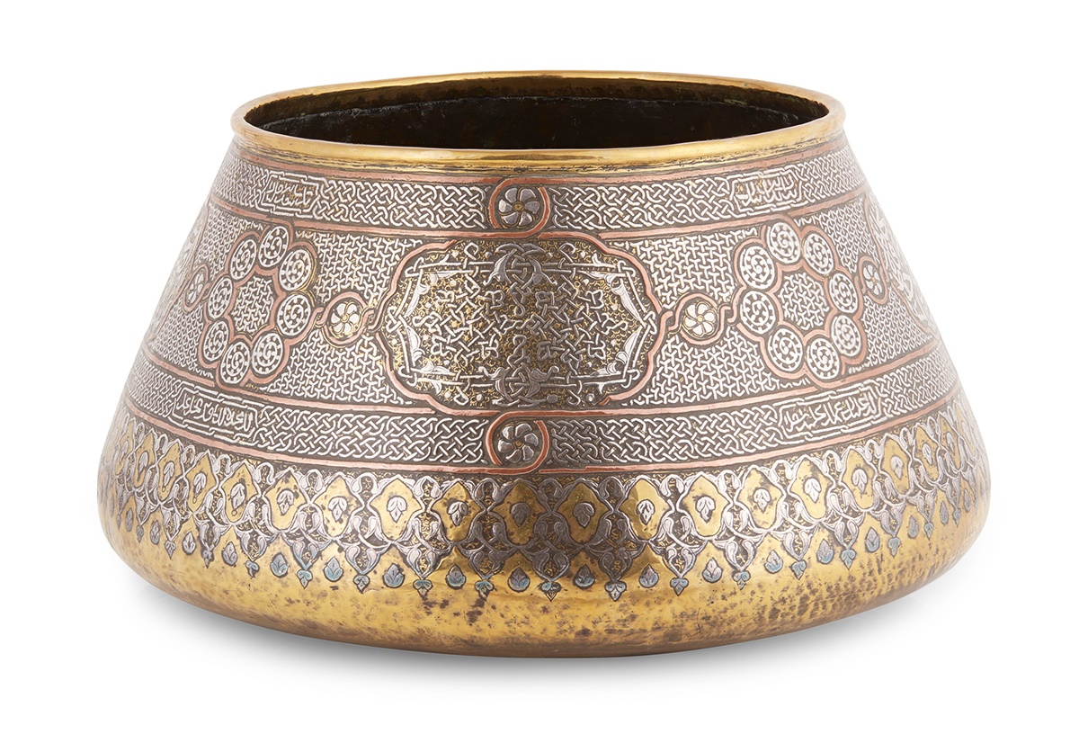 259 LARGE CAIROWARE SILVER AND COPPER BRASS INLAID BOWL EGYPT OR SYRIA, 19TH CENTURY OR LATER £800 - £1,200