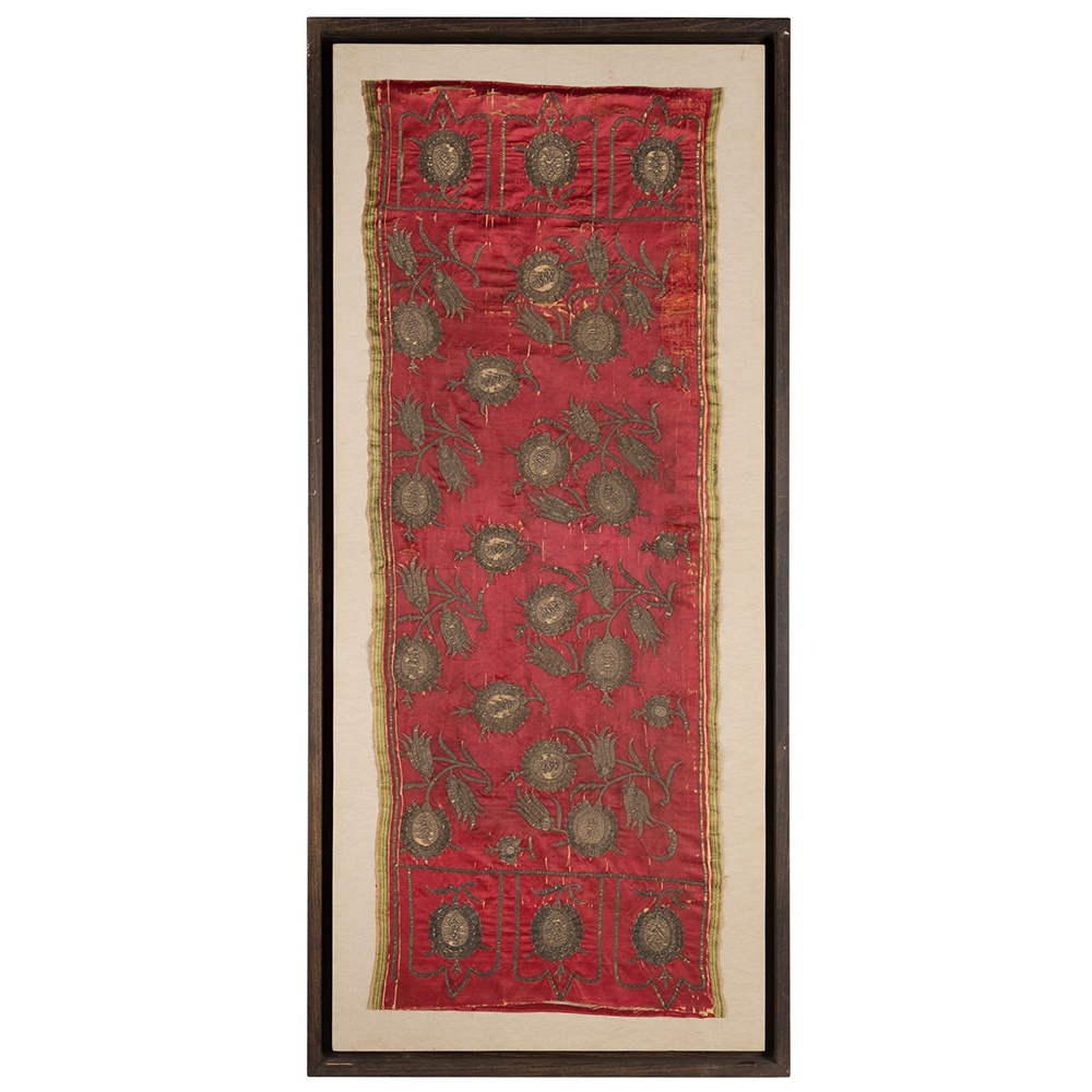 LOT 301 | OTTOMAN METAL-THREAD EMBROIDERED SILK PANEL WITH TULIPS AND POMEGRANATES | TURKEY, 17TH / 18TH CENTURY | £1,200 - £1,800 + fees