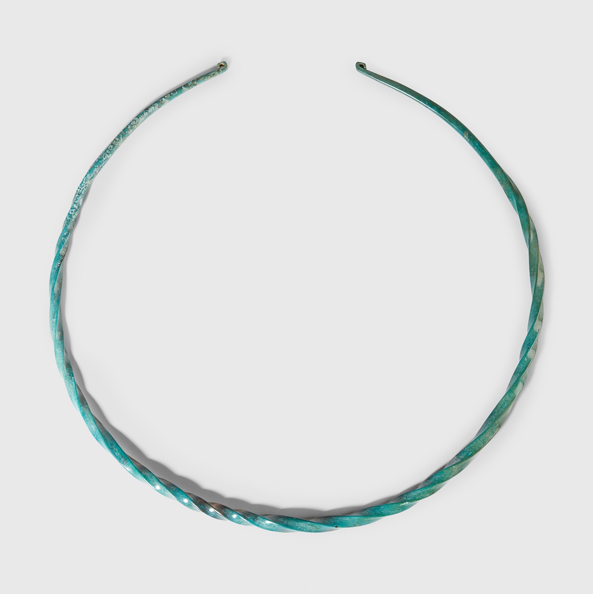 LOT 22 | BRONZE AGE NECK TORC | CENTRAL EUROPE, C. 1200 B.C. | £600 - £900 + fees