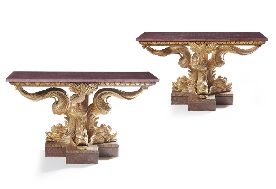 PAIR OF 'BRIDGWATER HOUSE' STYLE GILTWOOD, SCAGLIOLA PORPHYRY, AND PAINTED DOLPHIN CONSOLE TABLES