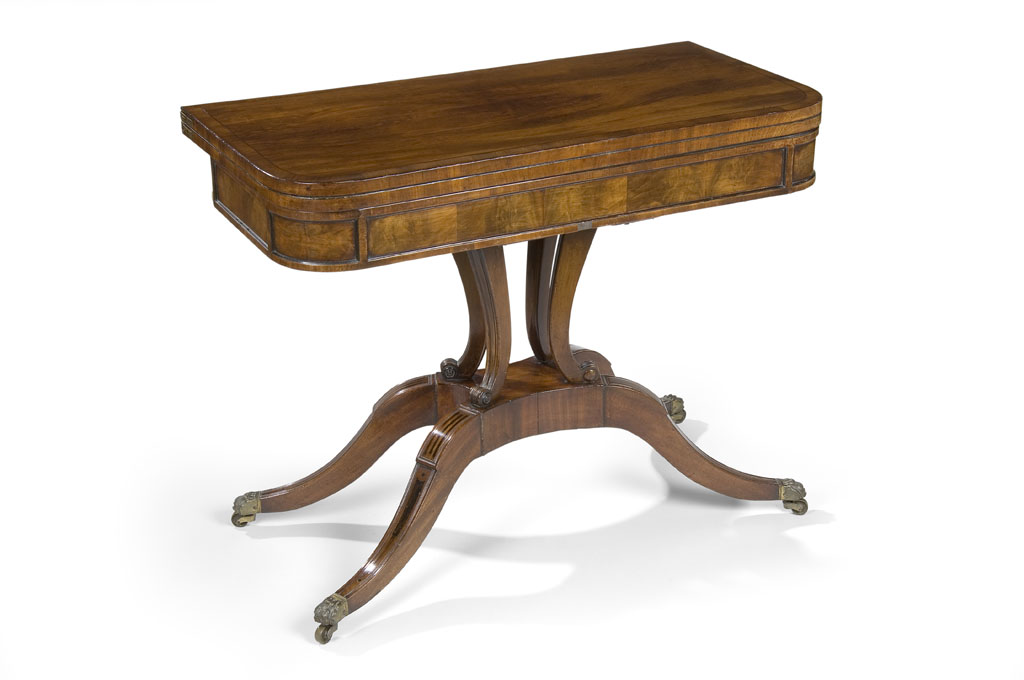 Lot 530 - A Regency mahogany, crossbanded and ebony lined 'D' shaped card table, circa 1815