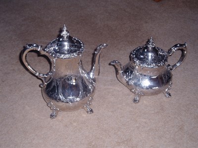 Lot 329 - A Victorian silver teapot and coffee pot, George Reilly, London, 1850