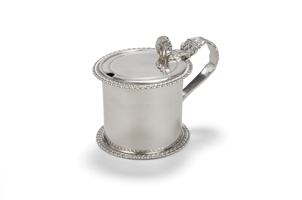 Lot 333 - An English Provincial silver mustard pot, James Barber, George Cattle and William North, York, date letter rubbed, circa 1830