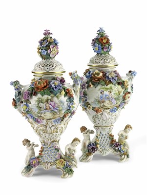 Lot 180 - A pair of 20th century Dresden vases and covers
