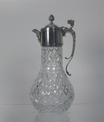 Lot 11 - A cut glass claret jug with plated mounts
