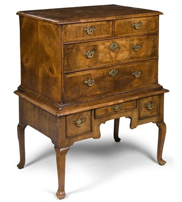Lot 694 - A Queen Anne walnut and feather banded chest...