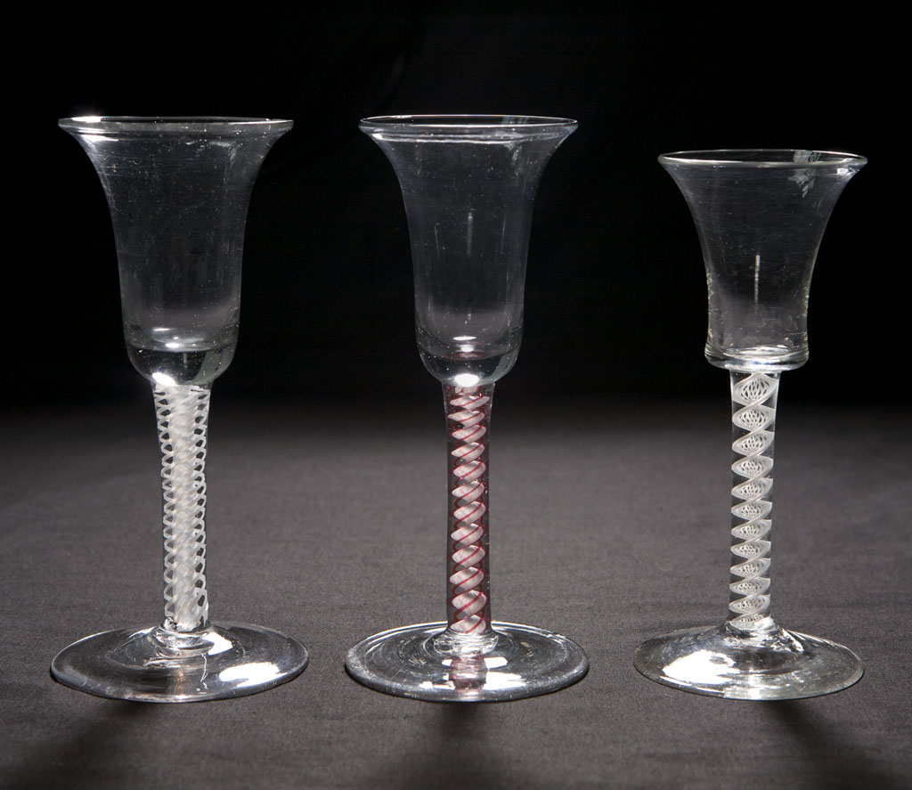 Lot 379 - Three air twist drinking glasses, 18th century...