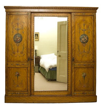 Lot 657 - A Victorian painted satinwood wardrobe,...