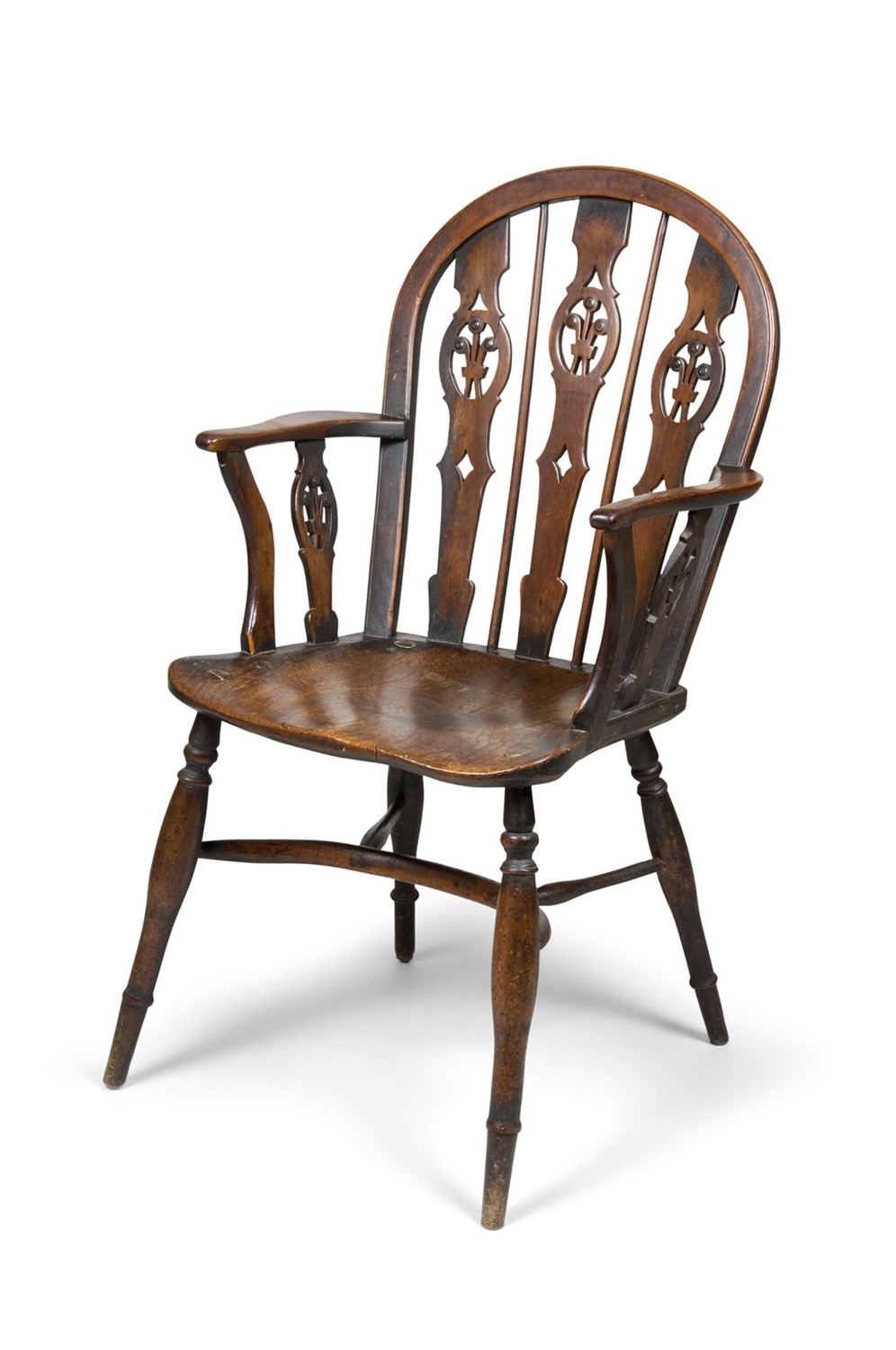 Lot 638 - A good yew wood and elm Windsor armchair, by...