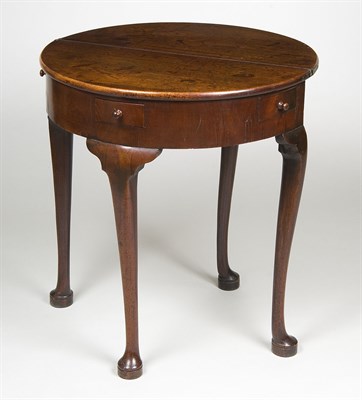 Lot 653 - A George II mahogany demi lune tea table,...