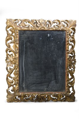 Lot 644 - A carved gilt and gesso Florentine mirrored...