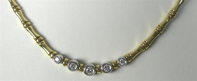 Lot 73 - A modern 18ct two-coloured gold mounted diamond necklace