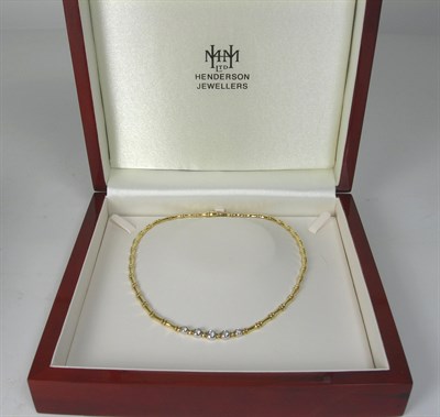 Lot 73 - A modern 18ct two-coloured gold mounted diamond necklace
