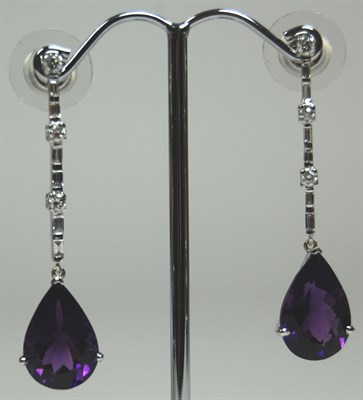 Lot 169 - An 18ct white gold mounted amethyst and diamond set suite