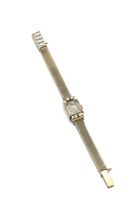 Lot 22 - ROLEX - a lady's 18ct gold wrist watch