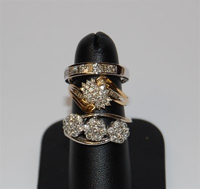 Lot 81 - An 18ct white gold mounted diamond half-eternity ring