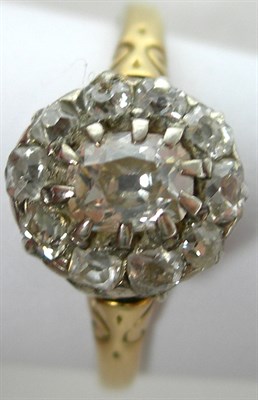 Lot 4 - An 18ct gold mounted diamond cluster ring