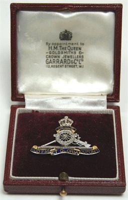 Lot 51 - An enamelled and diamond set Royal Artillery badge