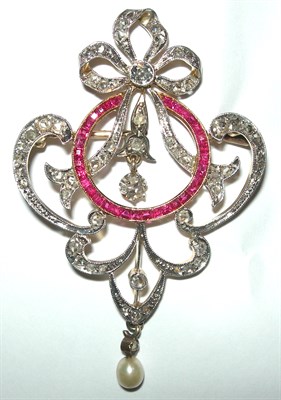 Lot 137 - An early 20th century ruby and diamond set brooch