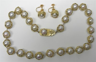 Lot 185 - CHARLES DE TEMPLE - an 18ct gold mounted cultured pearl set suite