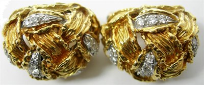 Lot 183 - KUTCHINSKY - a pair of 18ct gold mounted diamond set earrings