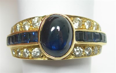 Lot 149 - An 18ct gold mounted sapphire and diamond set ring