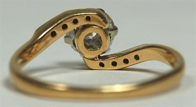 Lot 77 - An 18ct gold and platinum mounted diamond set ring