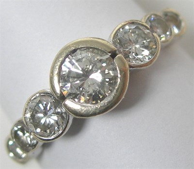 Lot 196 - A modern seven-stone diamond ring