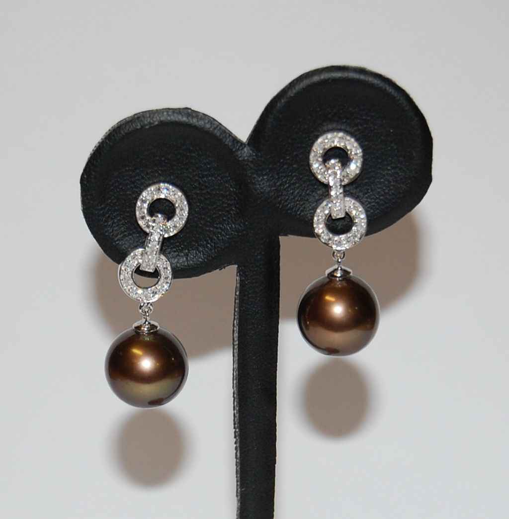 Lot 77 - A pair of 18ct white gold Tahitian pearl and diamond earrings