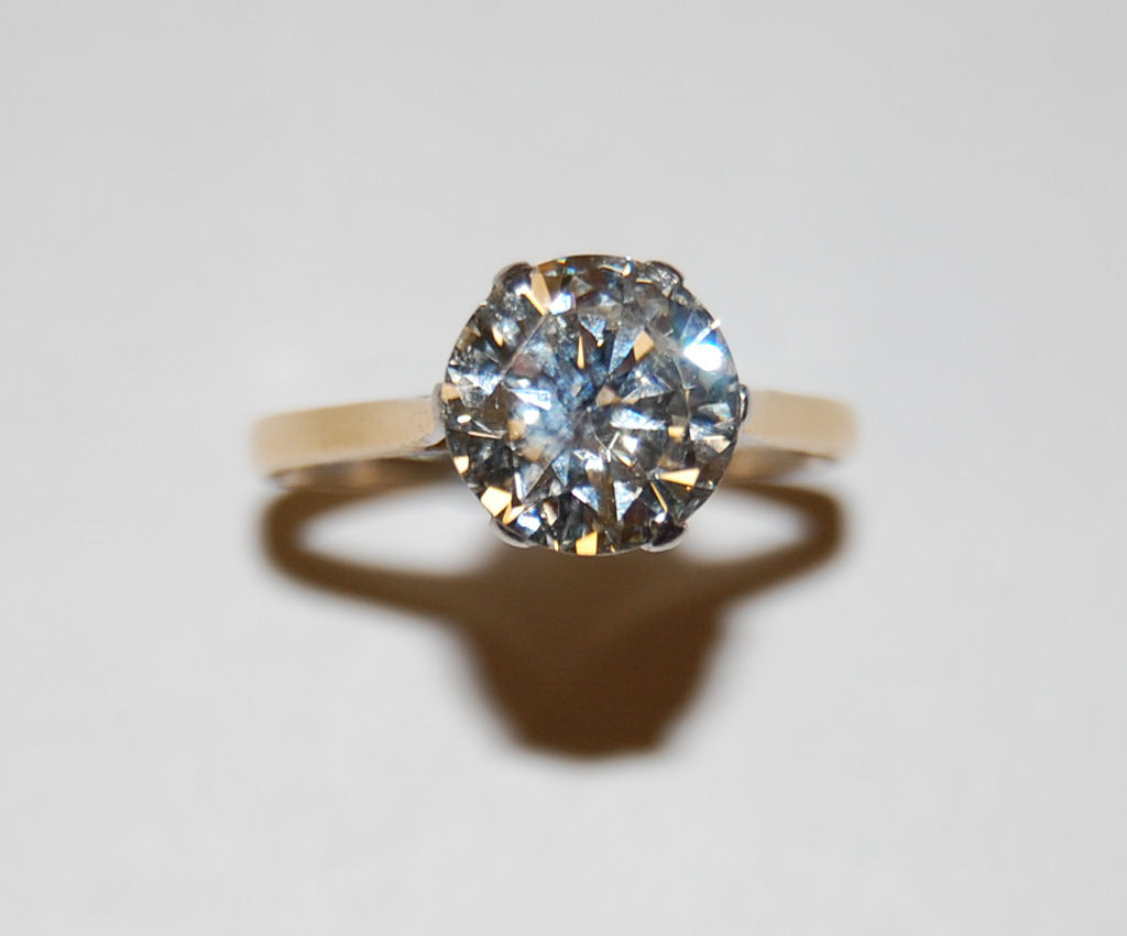 Lot 211 - An 18ct gold and platinum mounted solitaire diamond ring