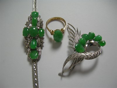 Lot 83 - An 18k white gold jade set bracelet