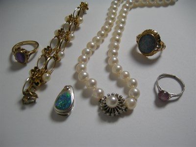 Lot 84 - A group of five various gem set dress rings