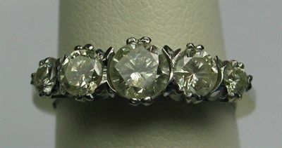 Lot 44 - A platinum mounted five-stone diamond ring