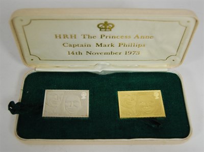 Lot 125 - A set of 22ct gold replica stamps