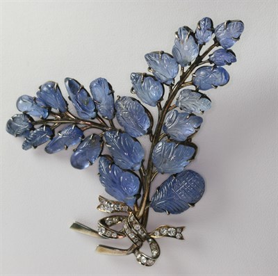 Lot 164 - An early 20th century sapphire and diamond set foliate spray brooch