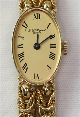 Lot 113 - L. U. CHOPARD - a 1970's lady's 18ct gold wrist watch