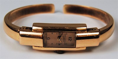 Lot 105 - BAUME & MERCIER - an Art Deco lady's 18ct gold wrist watch
