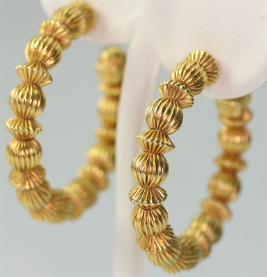 Lot 81 - A pair of 18ct gold Creole style earrings, probably by Ilias Lalaounis