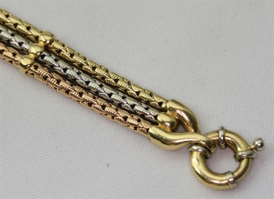Lot 147 - A contemporary three-coloured gold bracelet