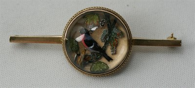 Lot 20 - An Edwardian 9ct gold mounted reverse painted crystal intaglio brooch