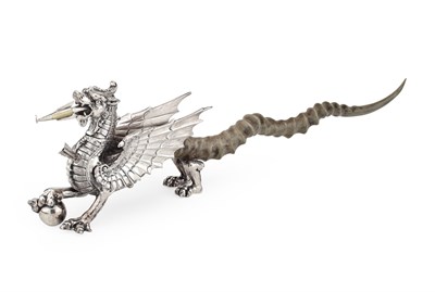 Lot 220 - Military interest - a Welsh Dragon table lighter