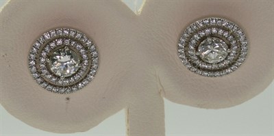 Lot 78 - A pair of diamond cluster earrings