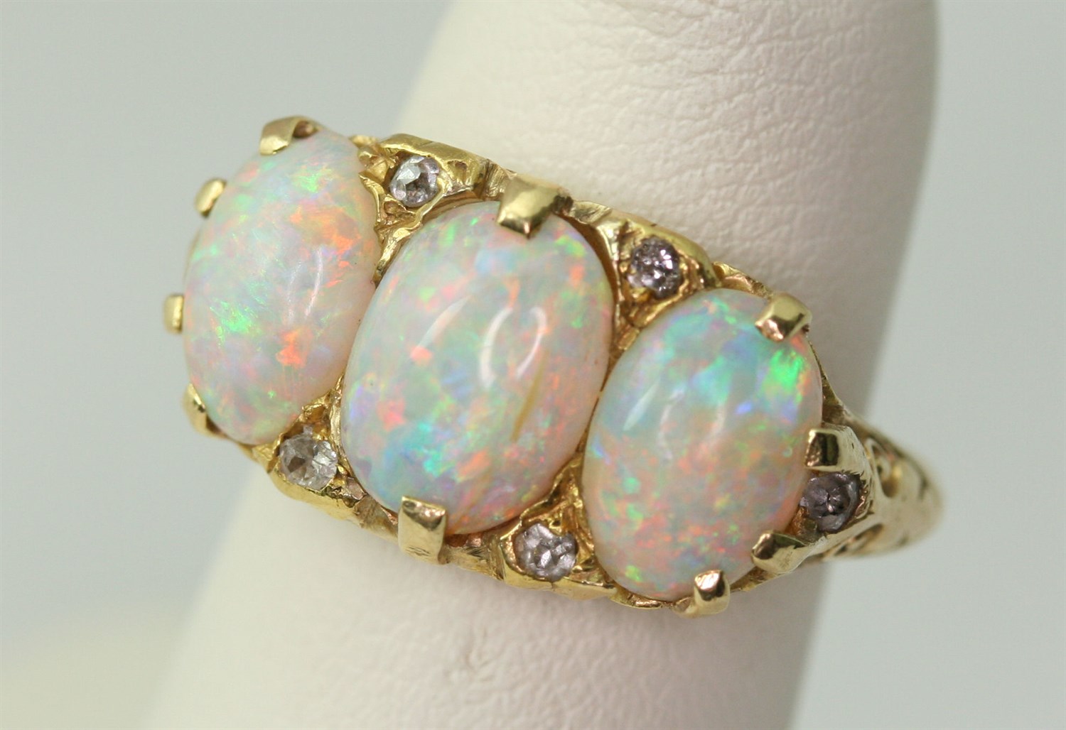 Lot 86 - A Victorian opal and diamond set ring