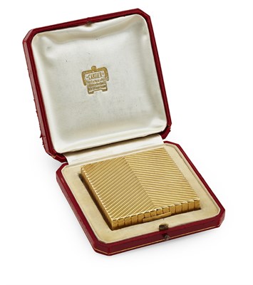 Lot 201 - CARTIER - a French gold compact