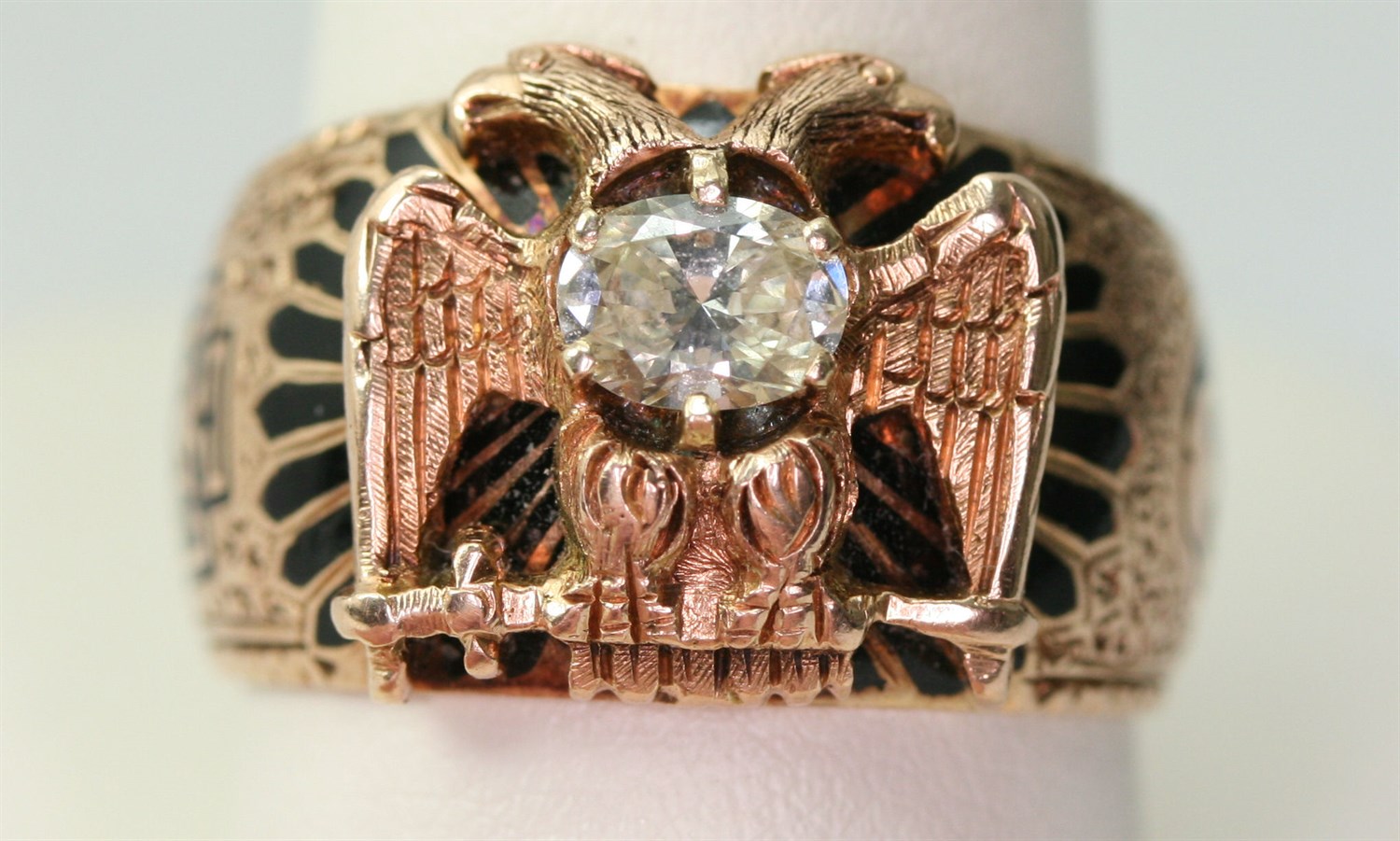 Lot 36 - An Edwardian gold, diamond set and enamelled Scottish Rite ring