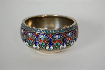 Lot 247 - A Russian silver and champleve enamel salt